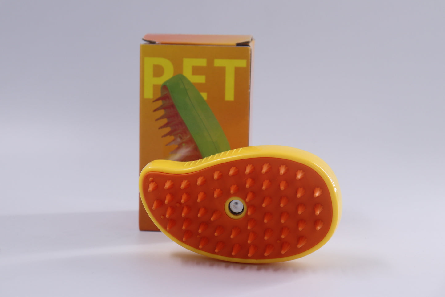Dispensador portátil para Mascotas + Cepillo de Masajes para Mascotas